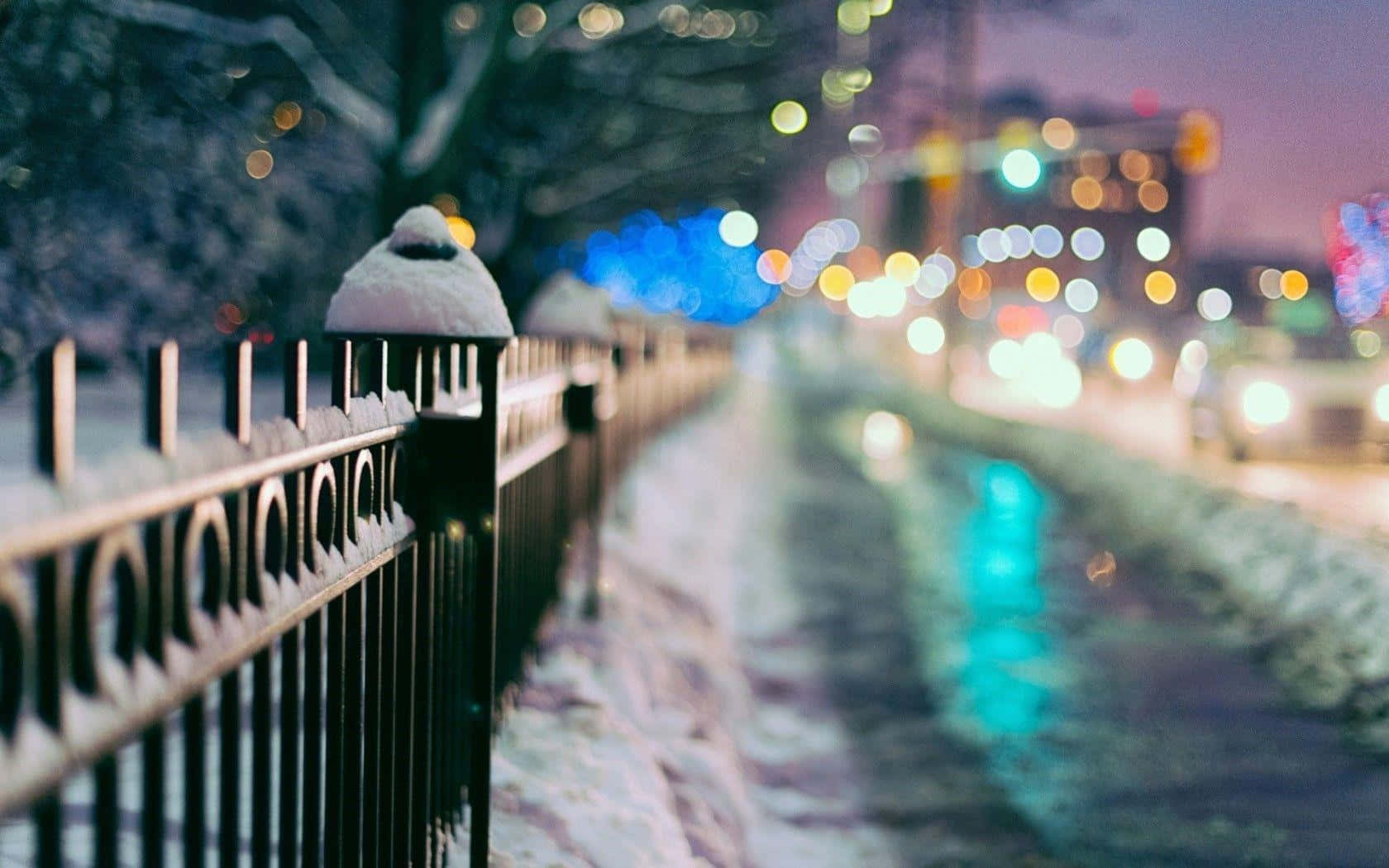 Paisajeurbano De Invierno Con Calle Y Edificios Cubiertos De Nieve. Fondo de pantalla