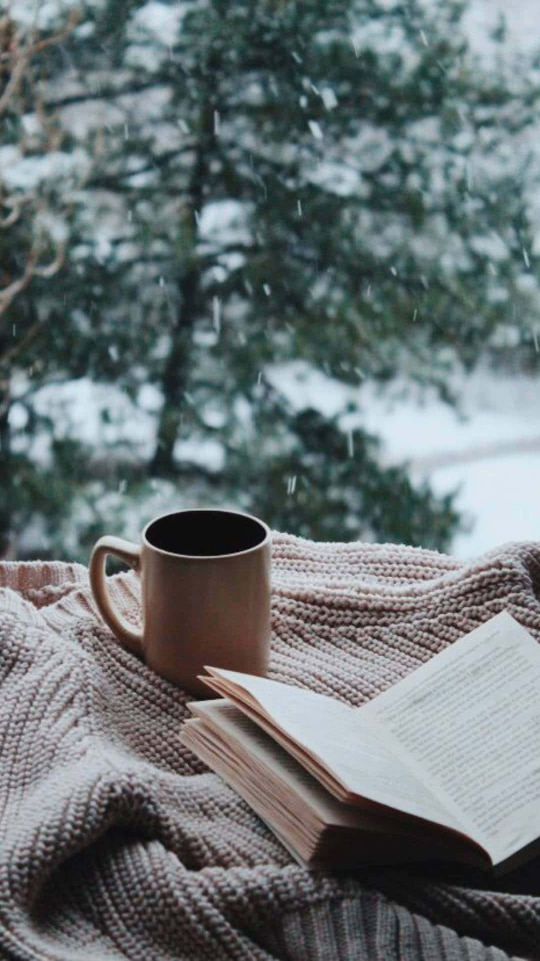 Winter Coziness With Book And Coffee Wallpaper