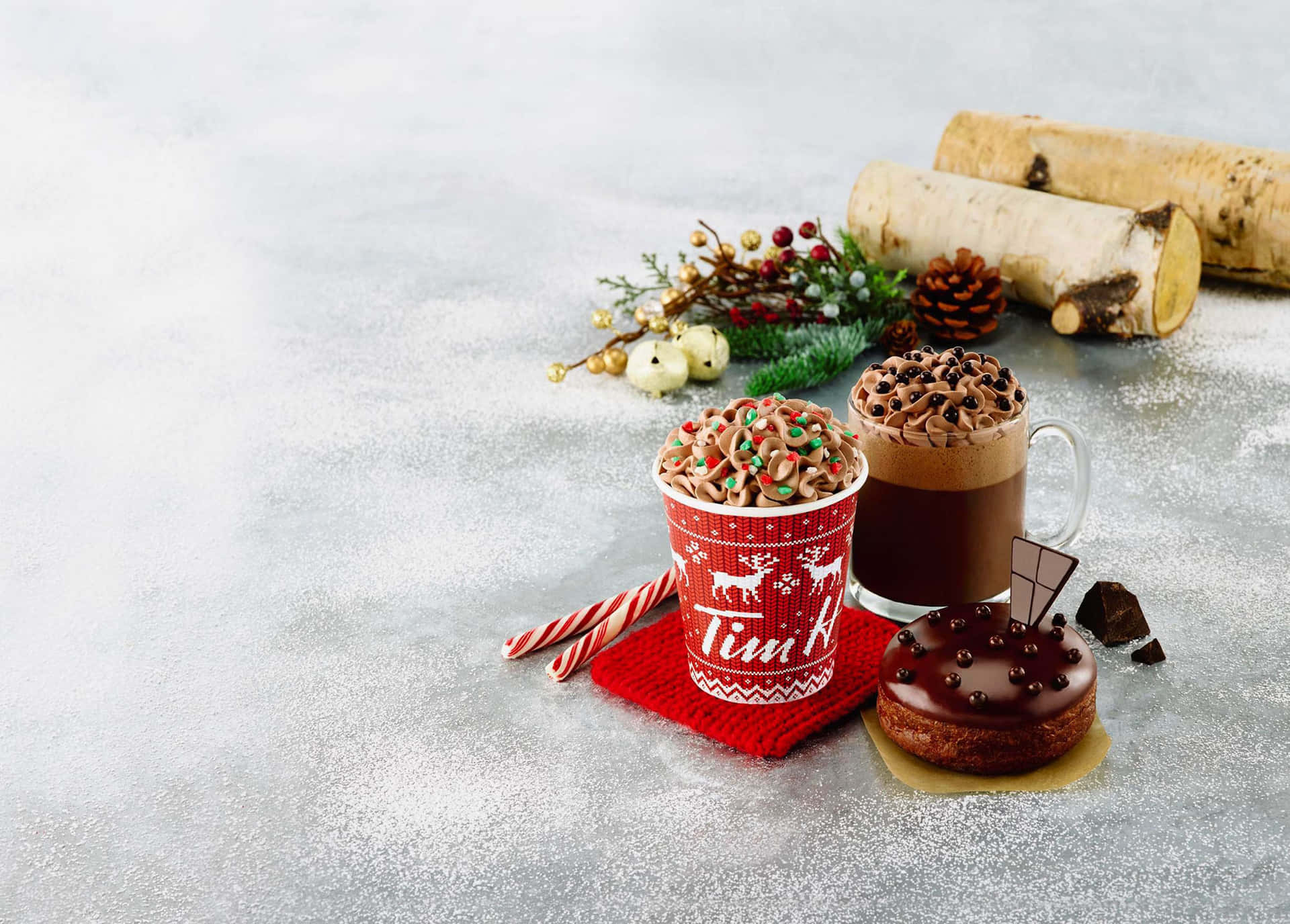 A mouthwatering assortment of winter desserts on a festive table Wallpaper