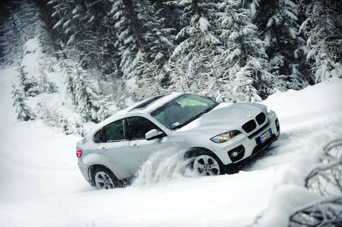 Winter Driving Conditions on a Snow-Covered Road Wallpaper