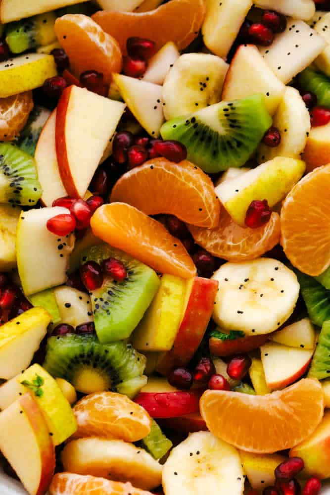 Assorted Winter Fruits on a Wooden Table Wallpaper