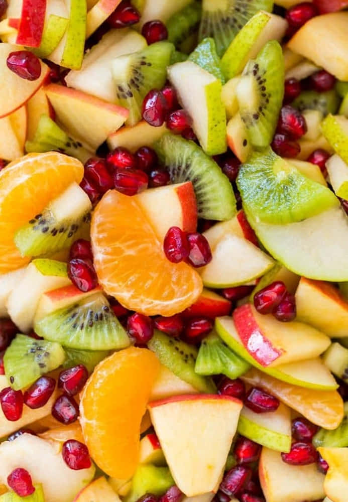 Unamezcla De Frutas De Invierno: Manzanas, Naranjas Y Bayas Fondo de pantalla