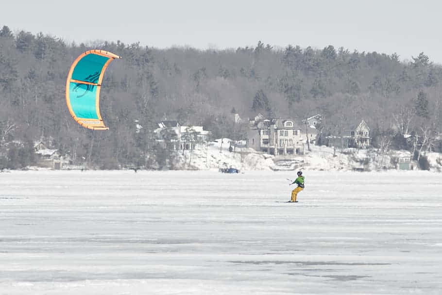 Winter Kite Surfingon Frozen Lake Wallpaper