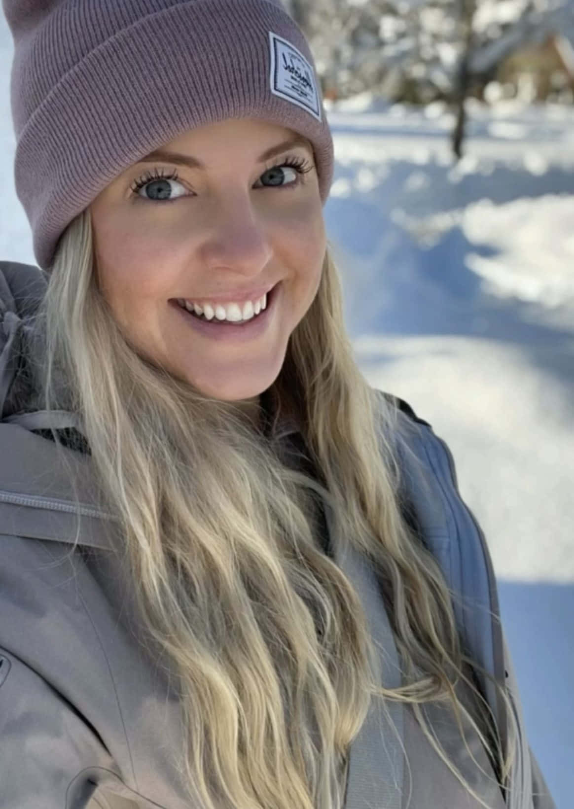Winter Selfie Smiling Woman Beanie Wallpaper