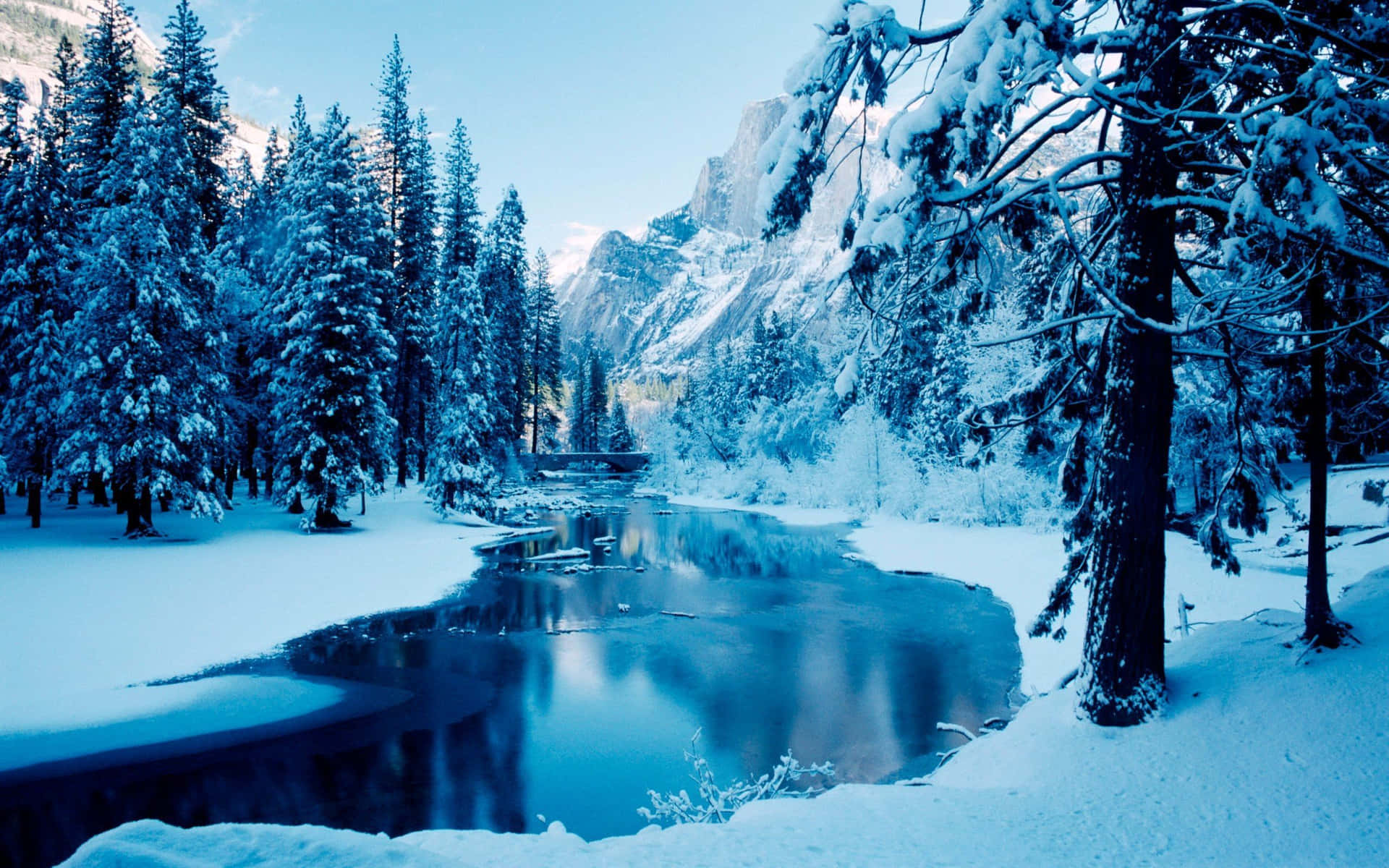 Snow-Covered Hills in rural winter landscape Wallpaper