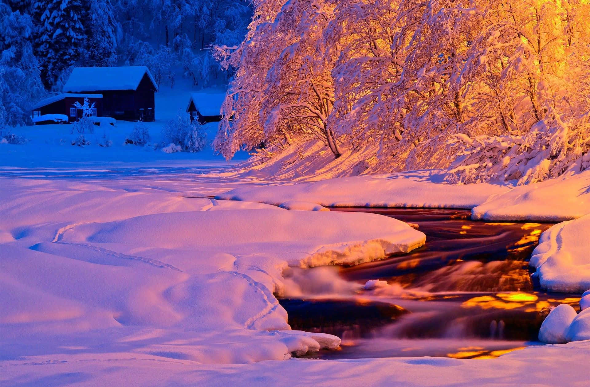 Stunning Winter Sunset over Snow-Covered Landscape Wallpaper