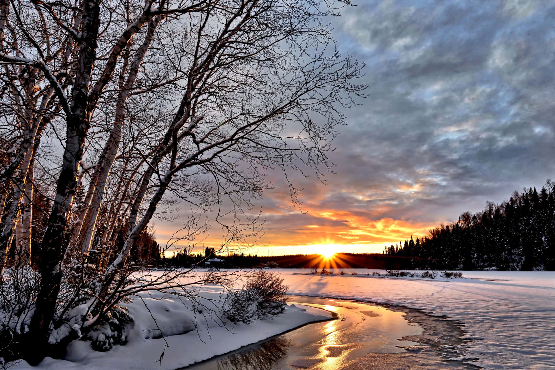 Caption: Enchanting Winter Sunset Wallpaper