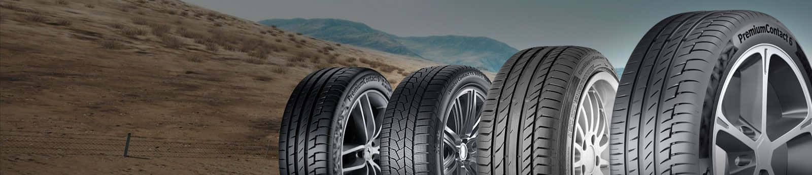 Download A set of brand new winter tires mounted on modern car wheels