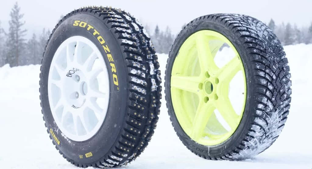 Winter Tires On Snow-covered Road Wallpaper