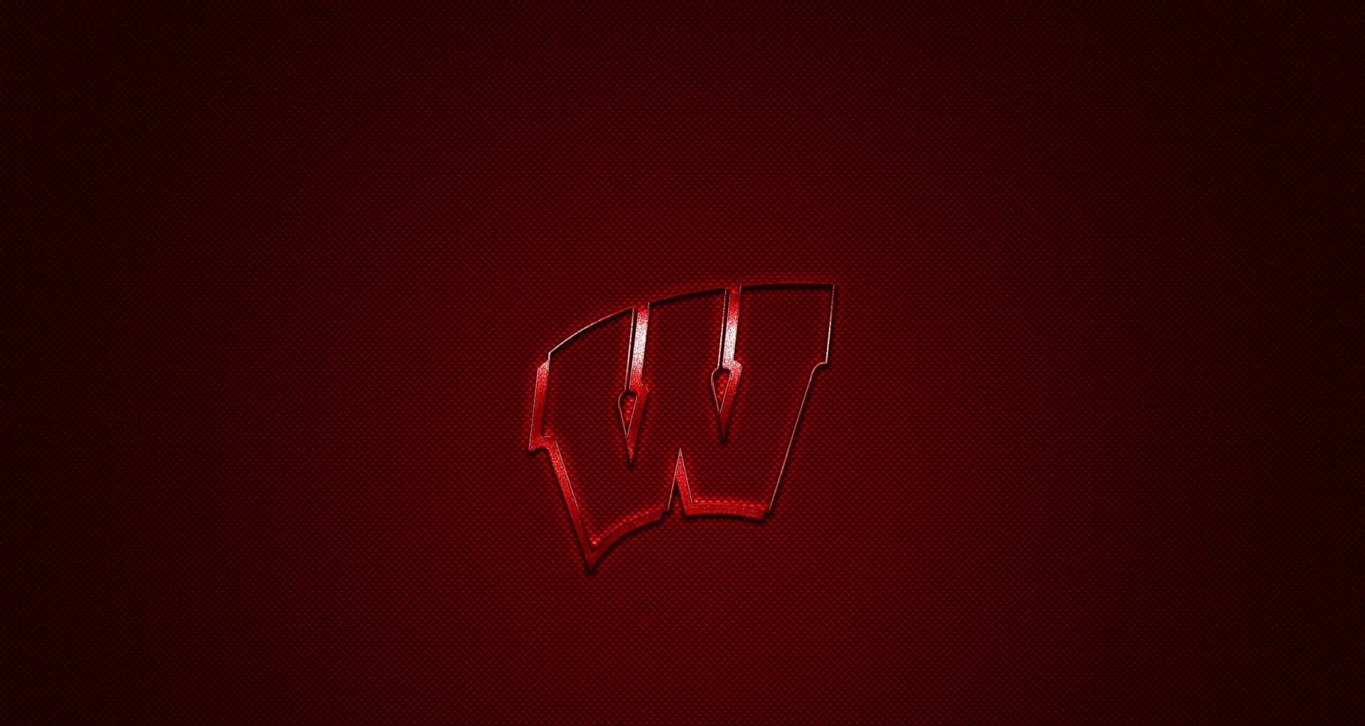 Caption: Wisconsin Badgers football team in action Wallpaper