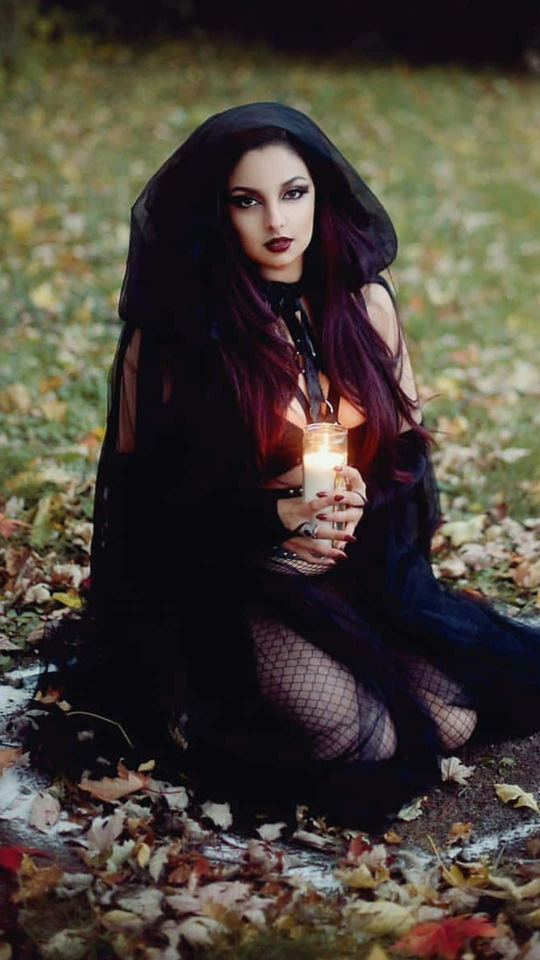 A bewitching witch costume for a spooky Halloween night. Wallpaper