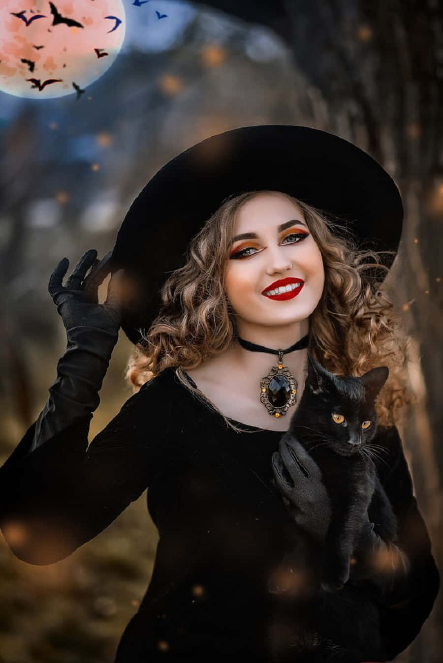 Spooky yet stylish witch costume with a classic hat Wallpaper