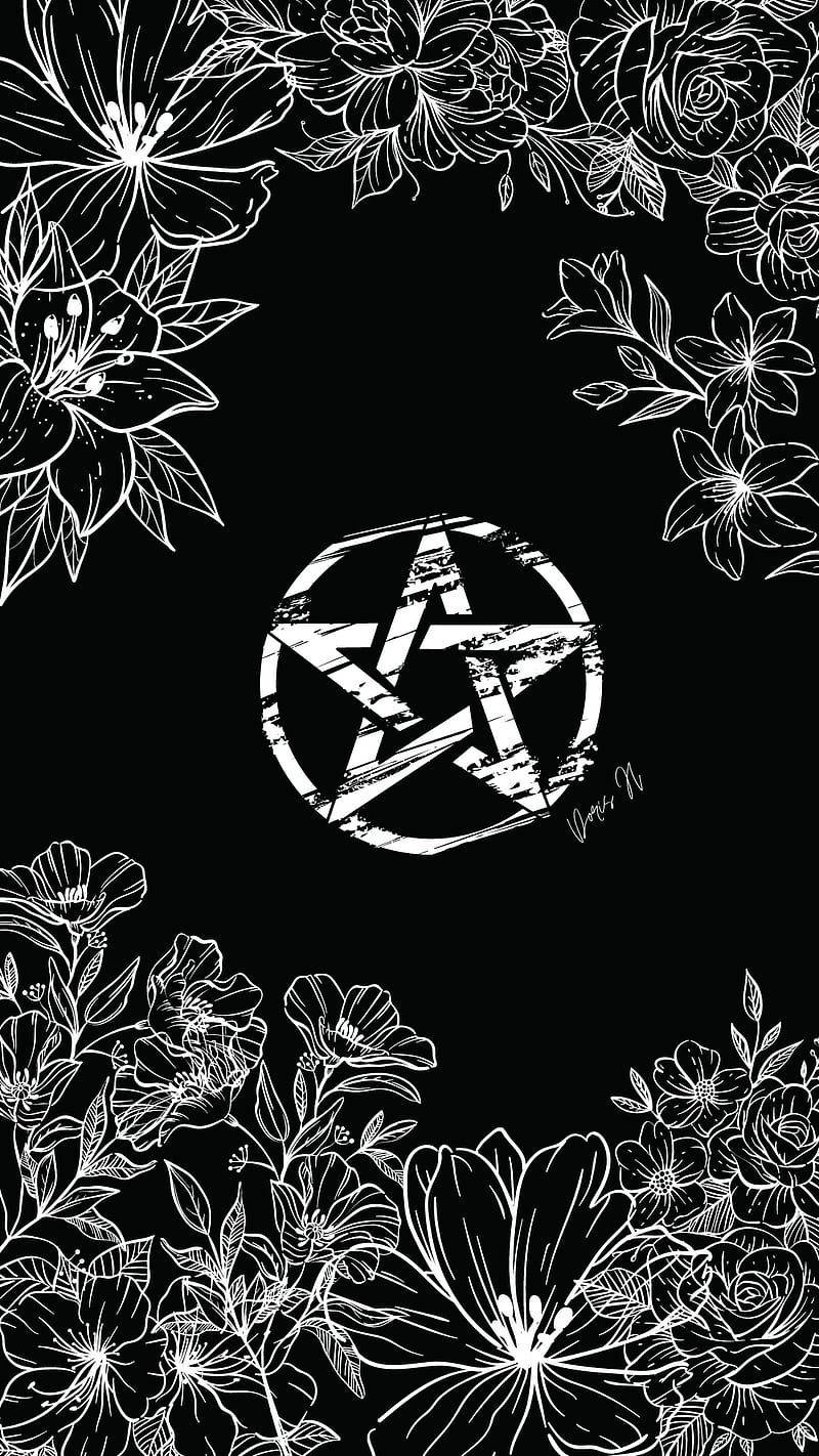A Black And White Image Of A Pentagram With Flowers Wallpaper