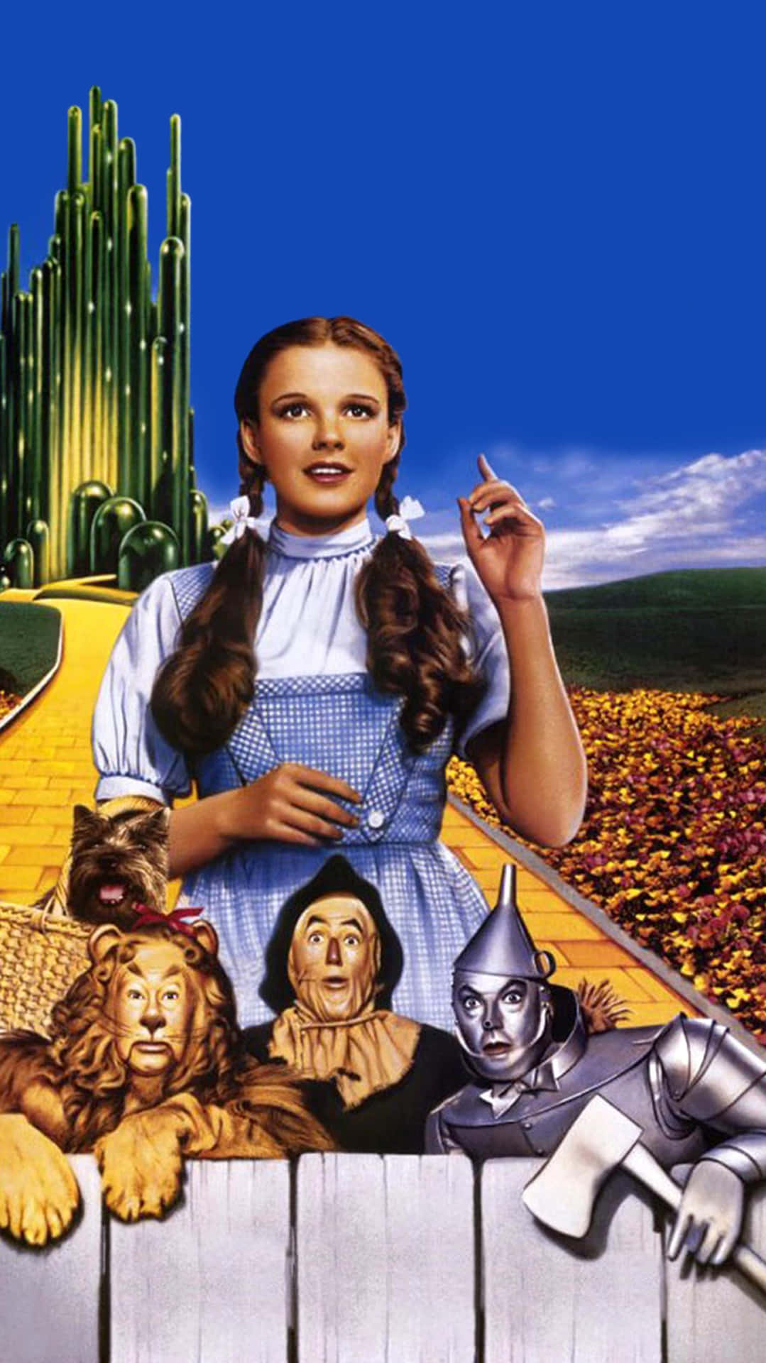 Dorothy, skræmmehræven, tinmanden og den frygtelige løve tager på en rejse ned ad den gule murstensvej. Wallpaper