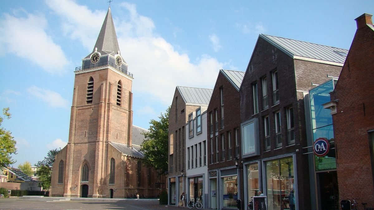 Woerden Historical Churchand Modern Shops Wallpaper