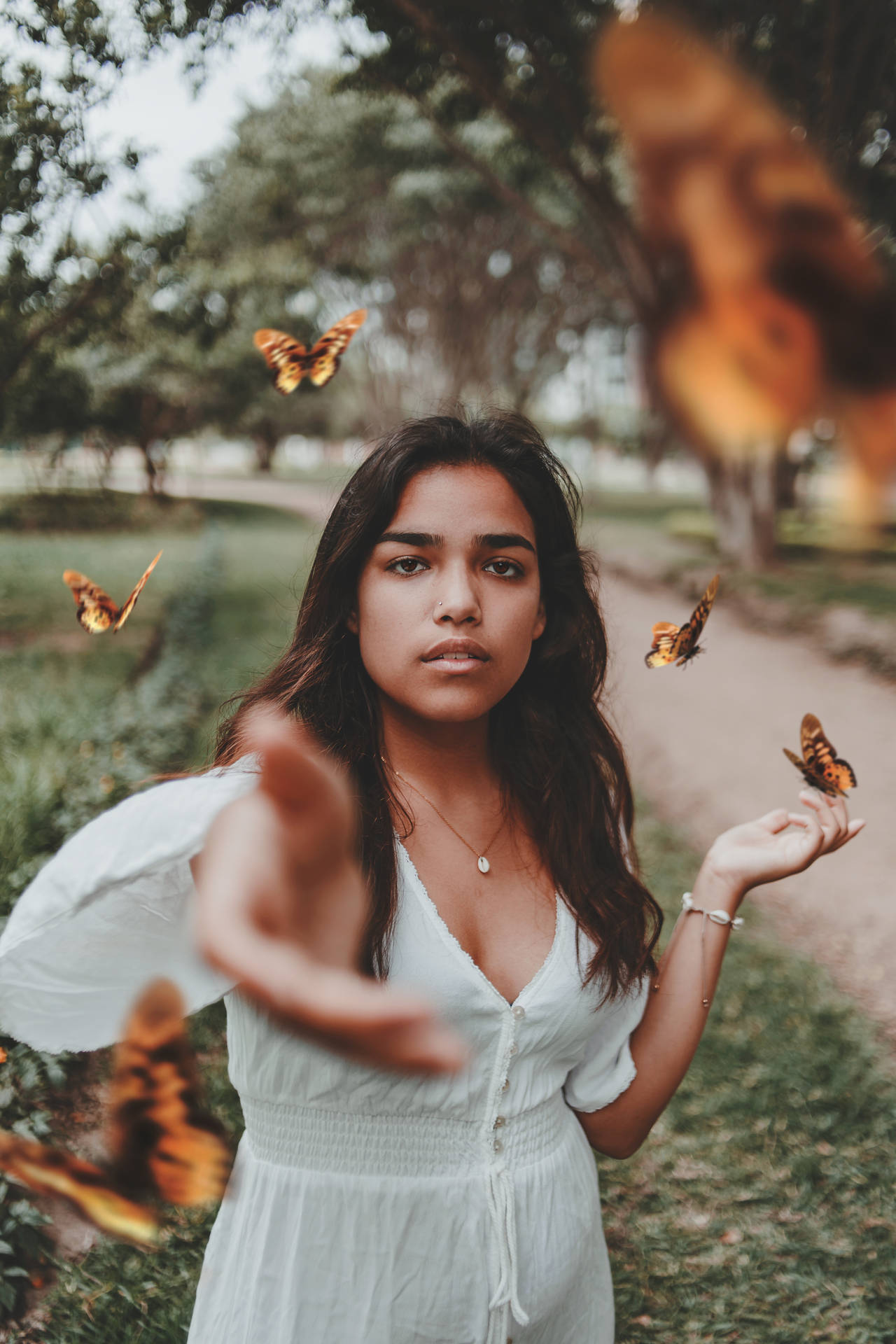 Woman And Cute Butterflies Wallpaper