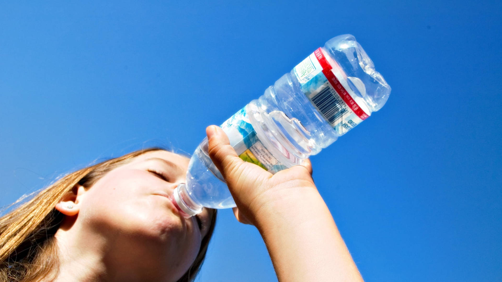 Woman Drinking Water From Bottle Wallpaper
