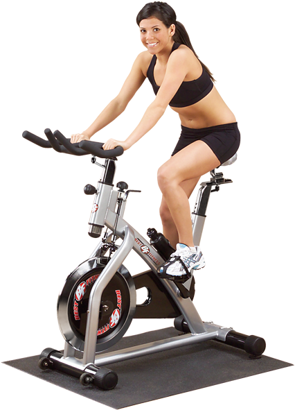 Woman Exercisingon Stationary Bike PNG