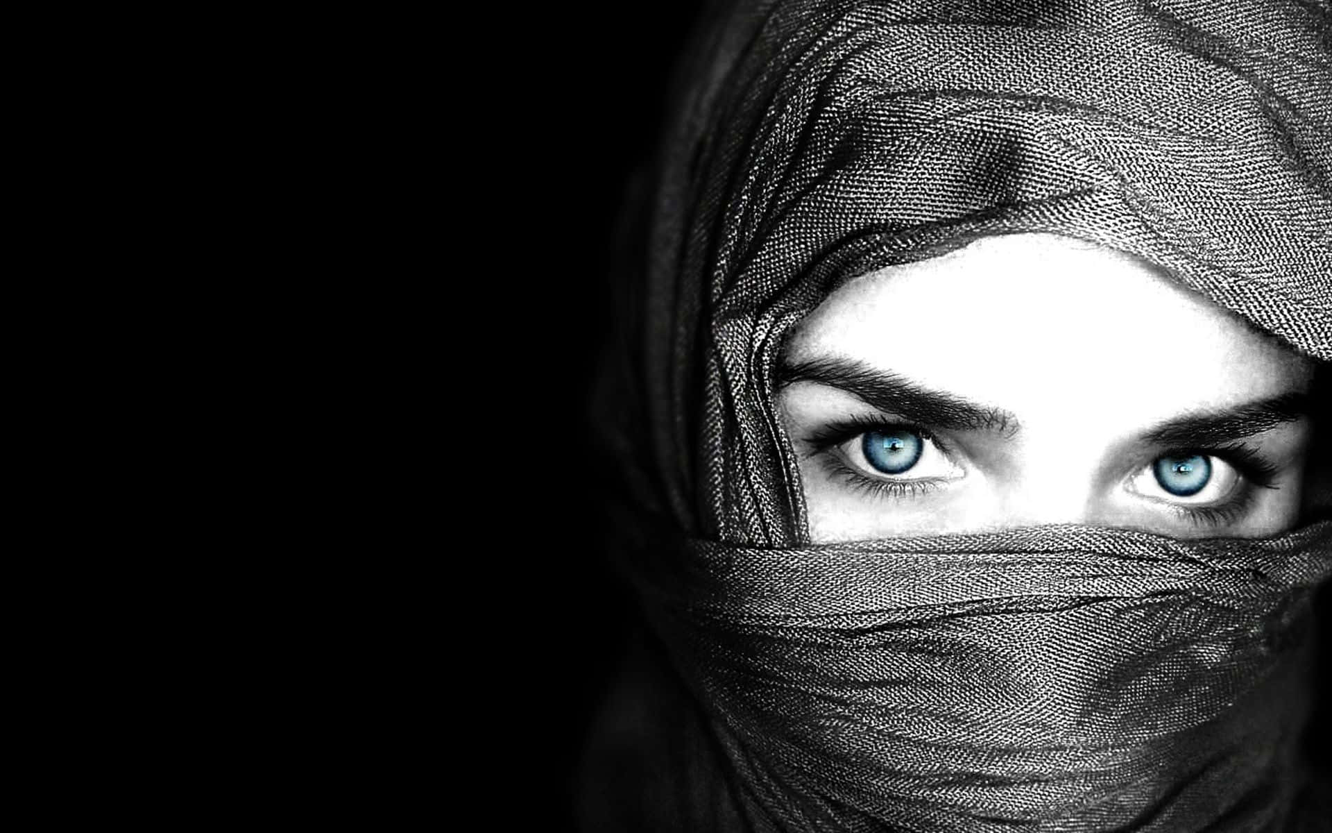 Kvinnamed Ögonen Täckta Av En Hijab Som Bildskärm Bakgrund. Wallpaper