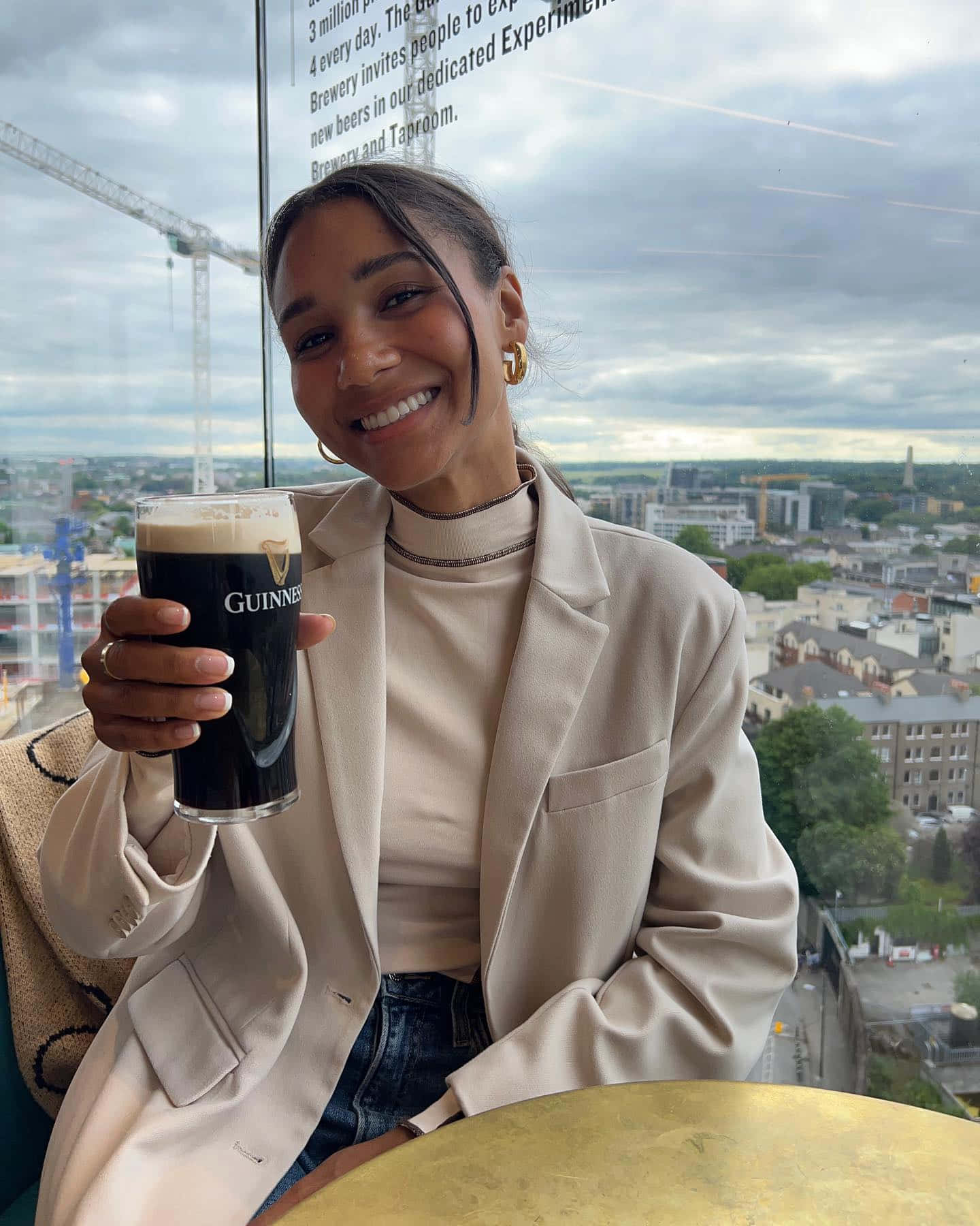 Woman Holding Guinness Pint Smile Wallpaper
