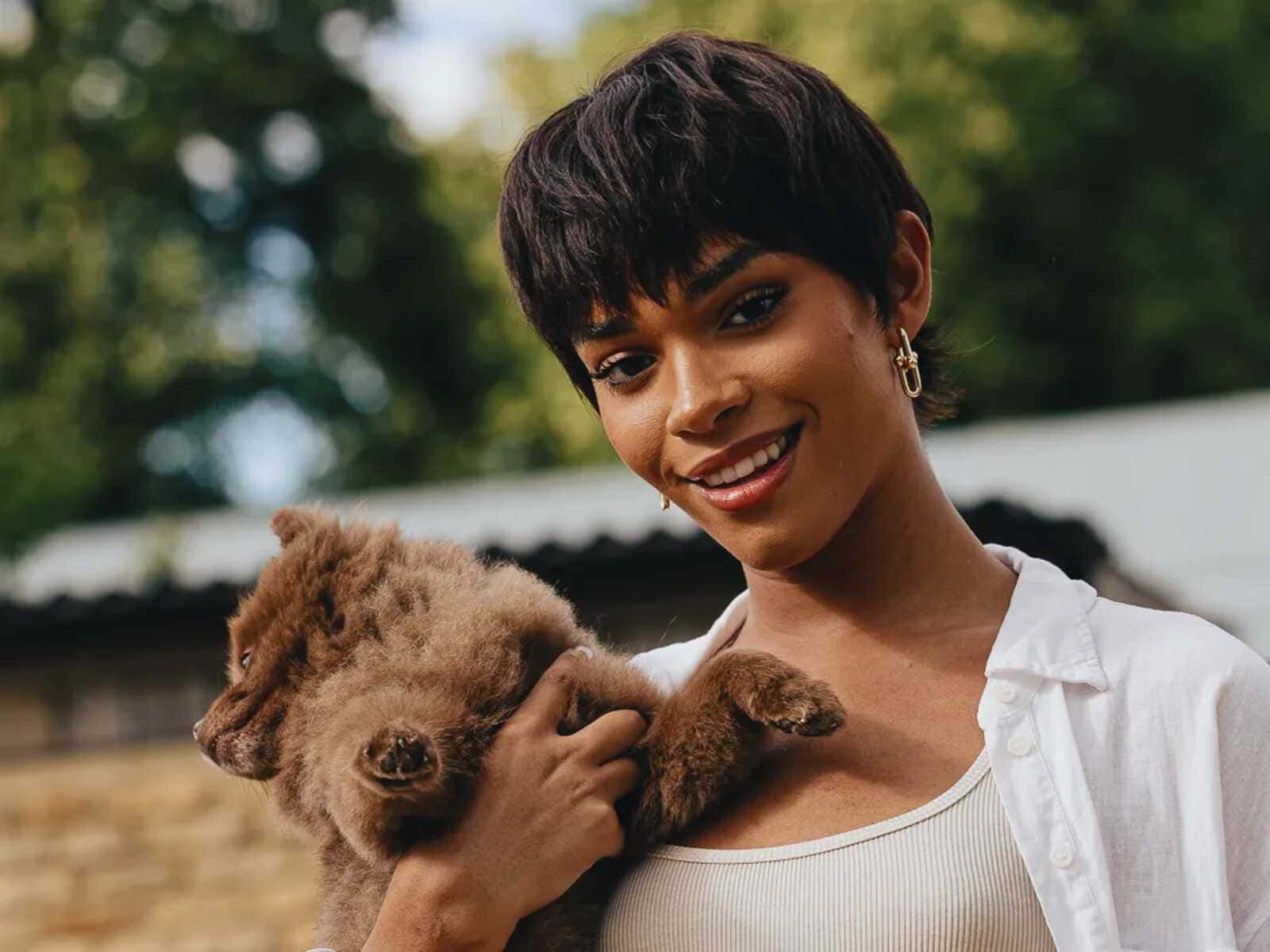 Woman Holding Small Bear Wallpaper