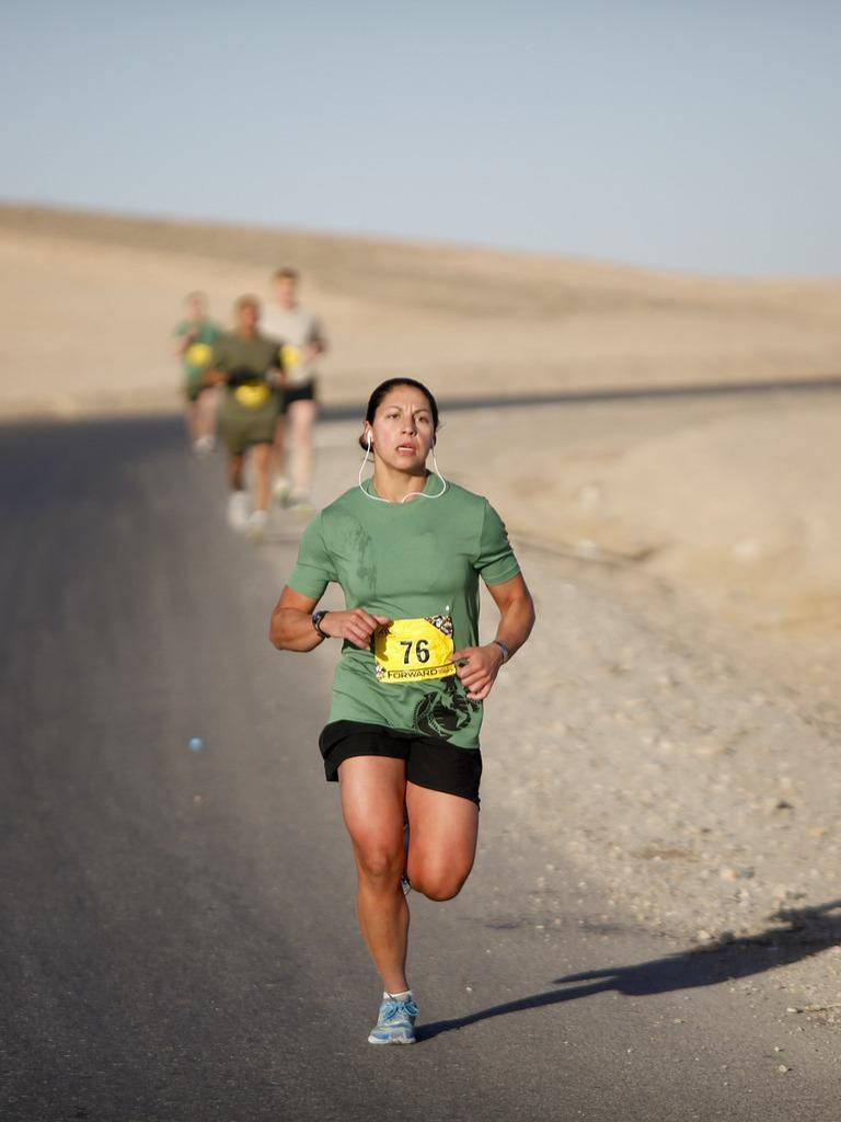 Woman In A Marathon