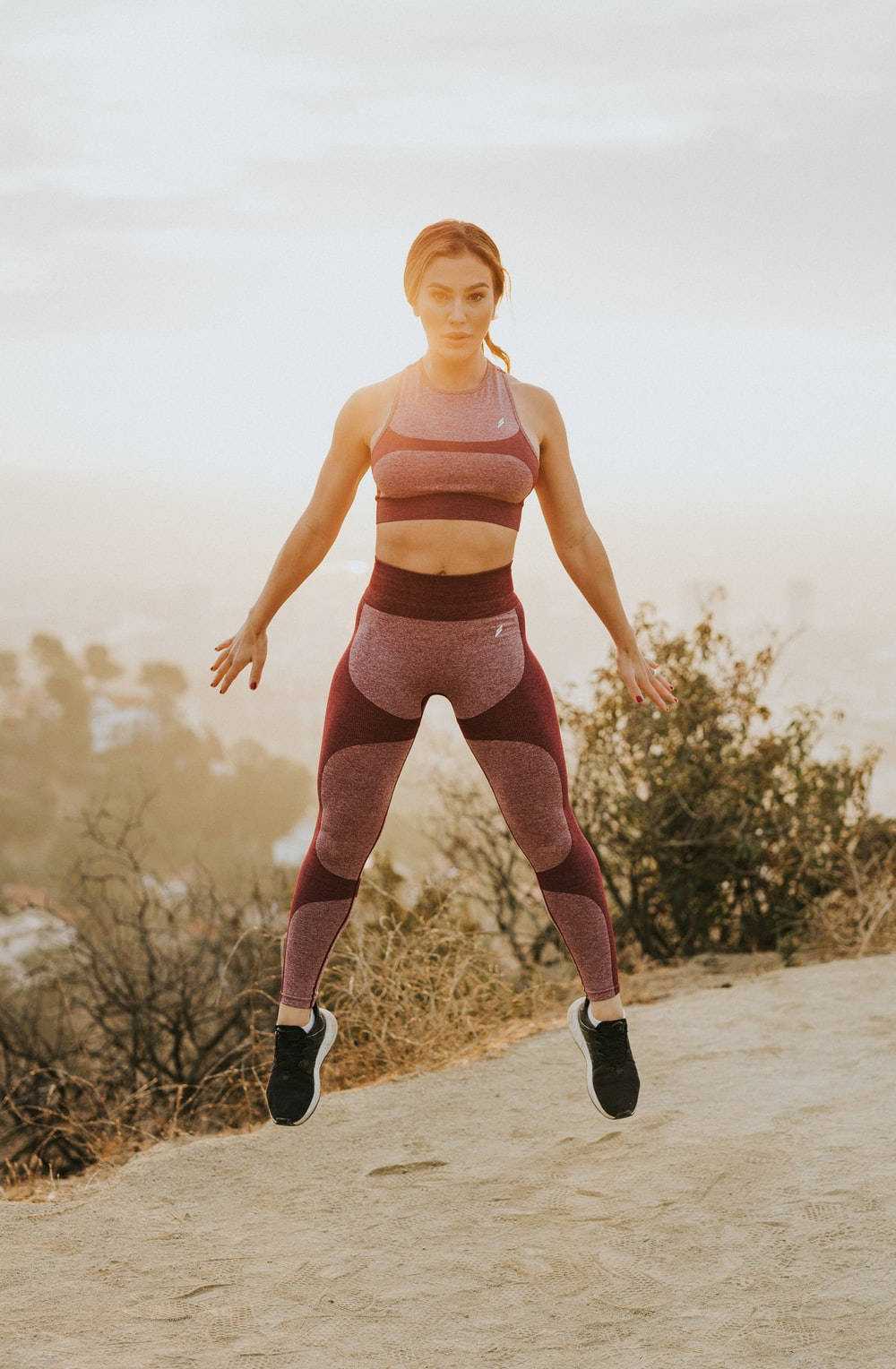 Woman In Athletic Wear Outdoors Wallpaper
