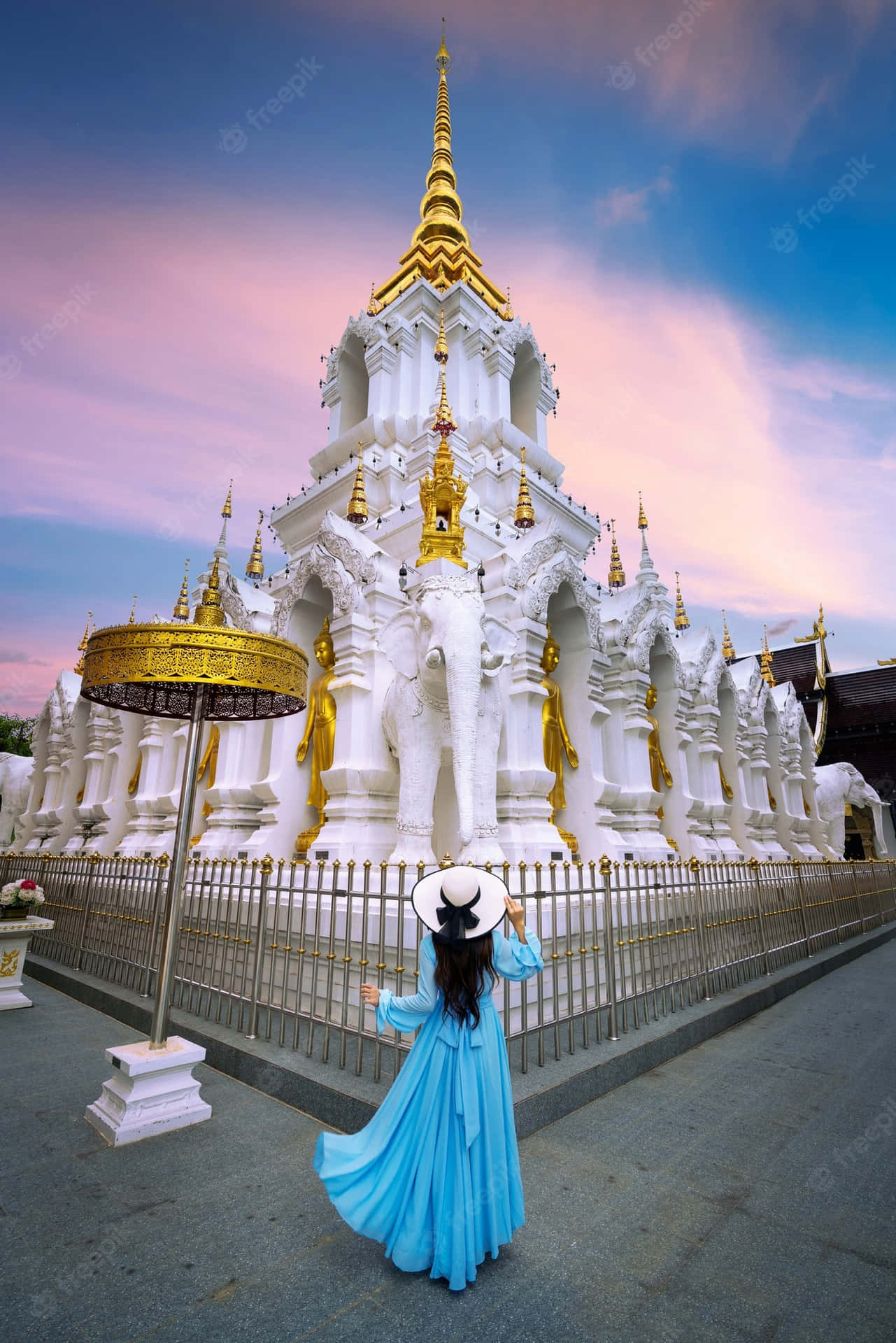 Woman In Blue In White Temple In Chiang Rai Wallpaper