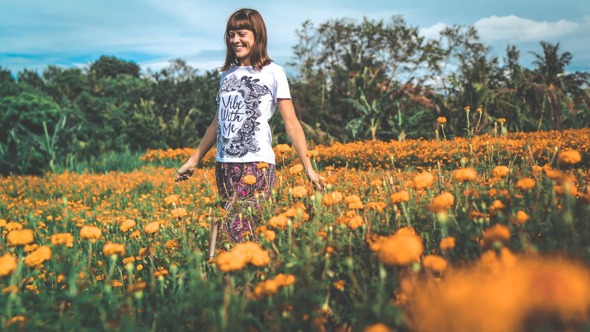 Woman In Marigold Flower Field Wallpaper