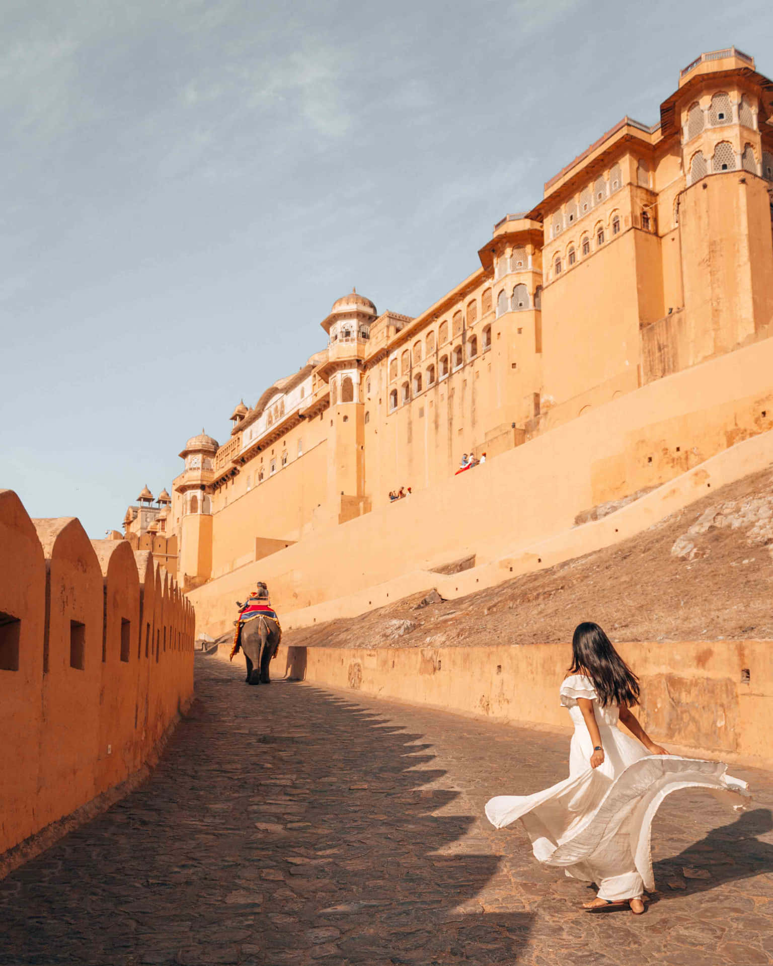 Woman In White In Amer Fort Wallpaper