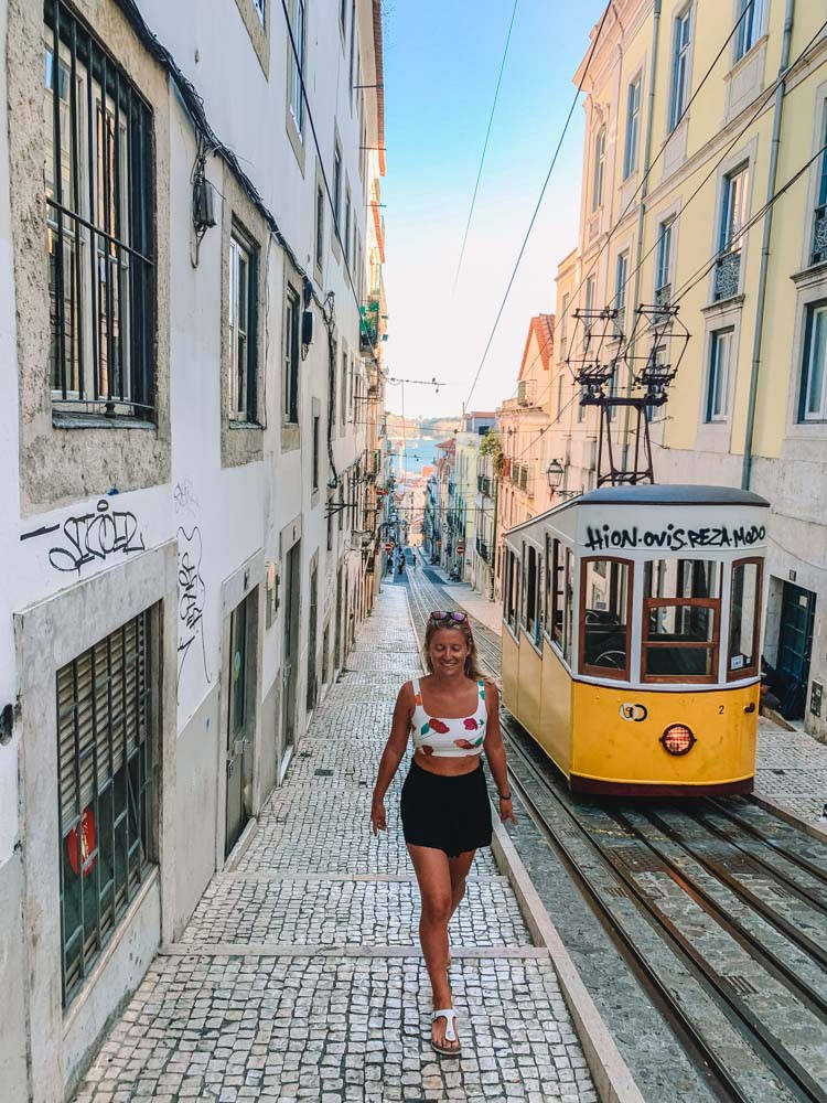 Woman Near Tram Lisbon Background