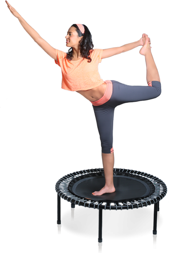 Download Woman Performing Yoga Poseon Trampoline | Wallpapers.com