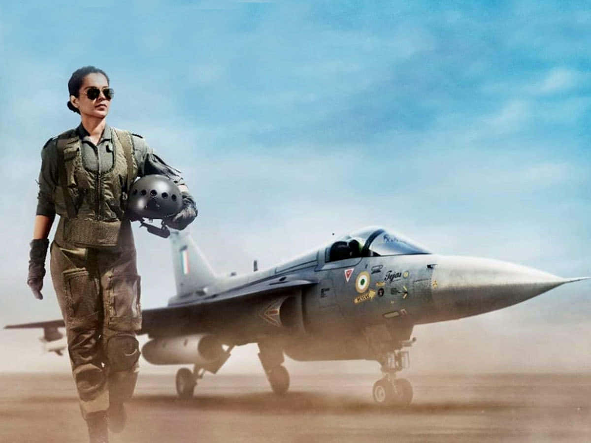 Woman Pilot And Her Aircraft Wallpaper