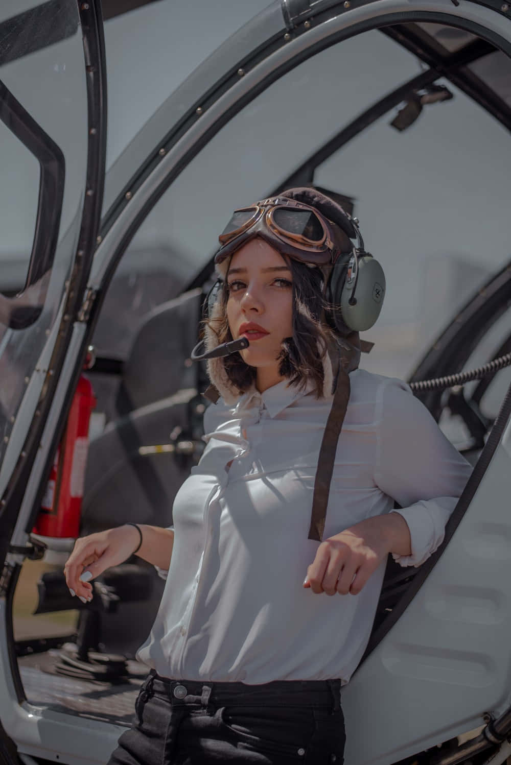 Woman Pilot Beside Cockpit Wallpaper