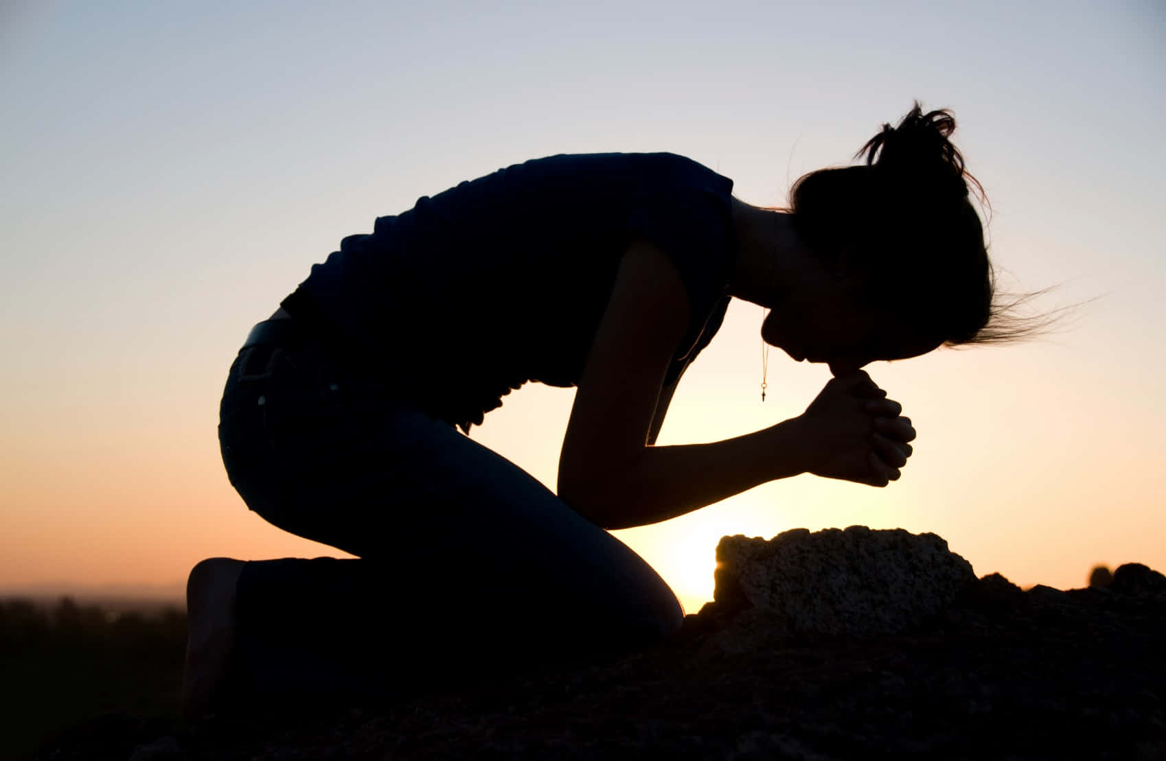 Woman Praying And Kneeling Silhouette Wallpaper