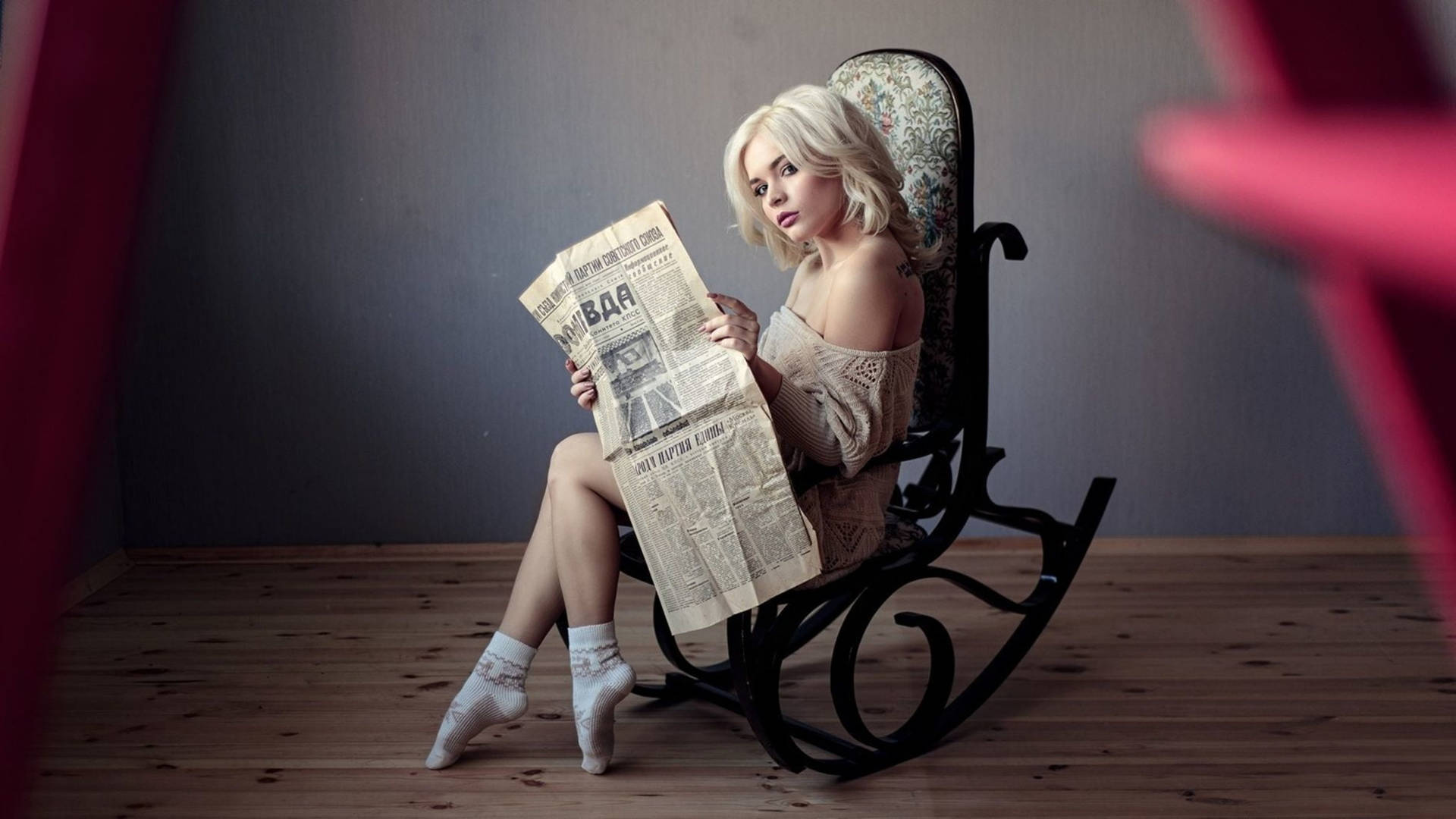 Woman Reading Newspaper