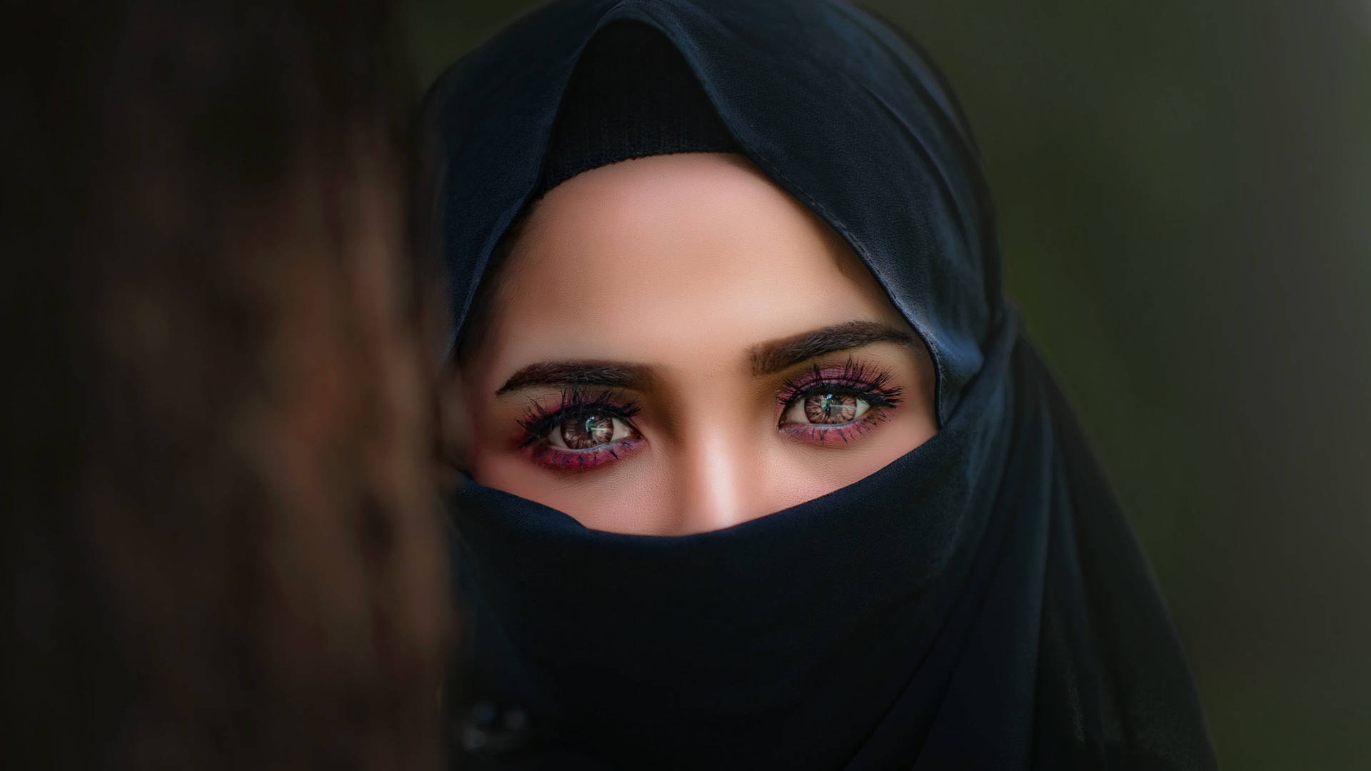 Woman's Face Under Black Hijab Wallpaper