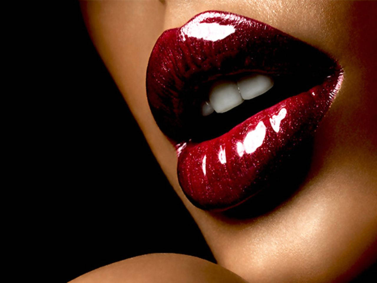 Woman's Red Glittering Lips Wallpaper