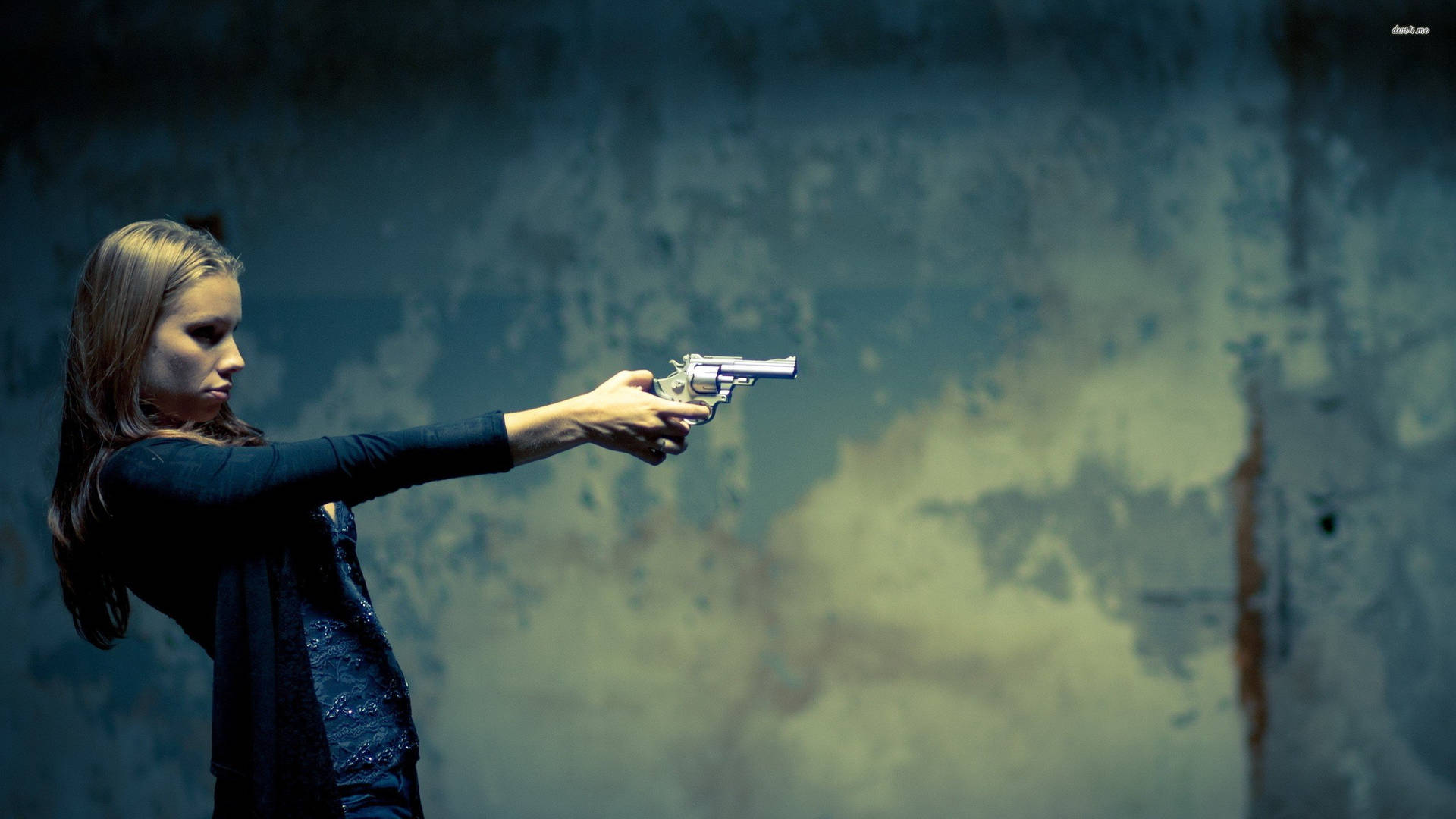 Woman Shooting With A Pistol Wallpaper