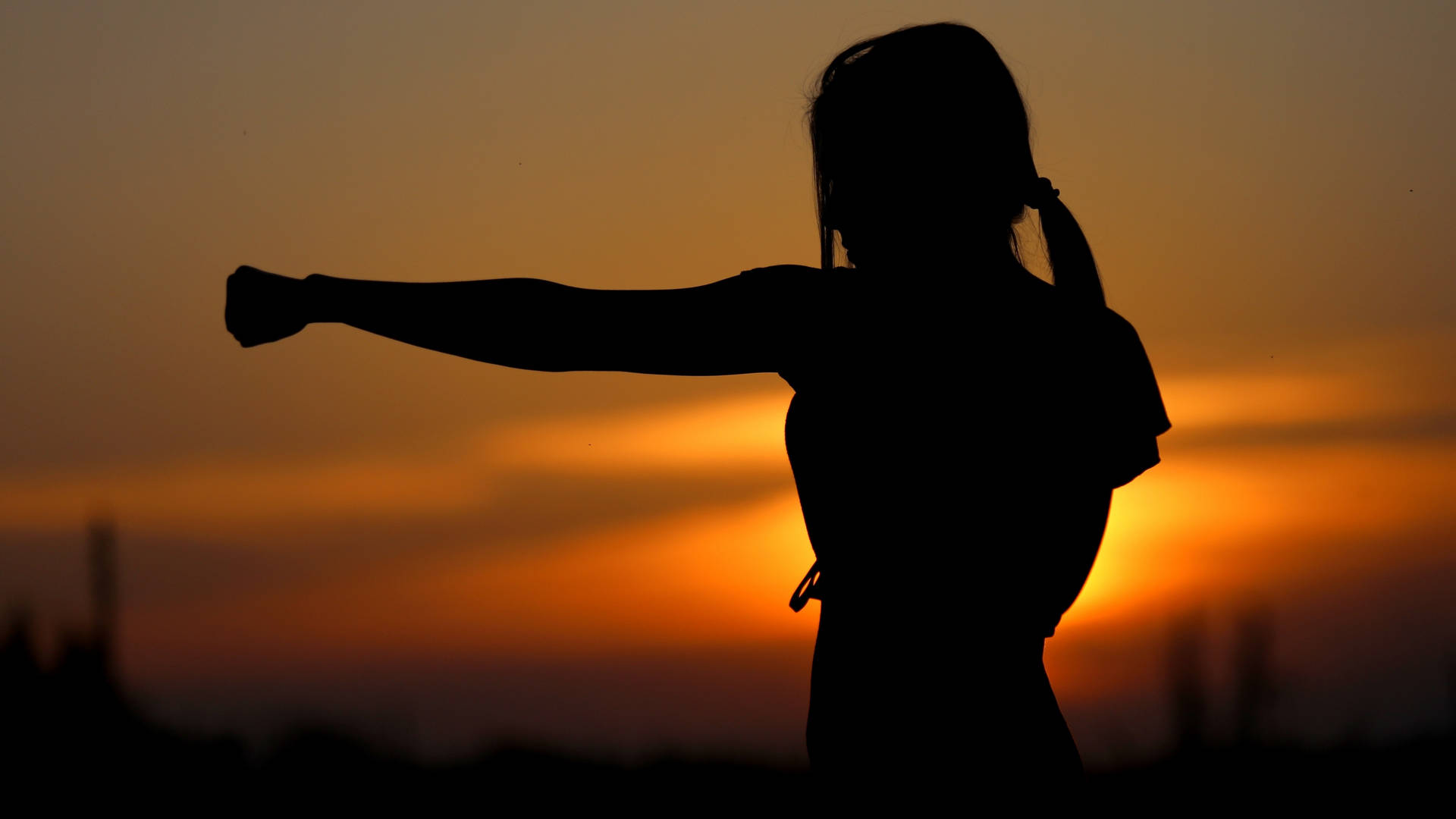 Woman Silhouette Doing Boxing Exercise Wallpaper