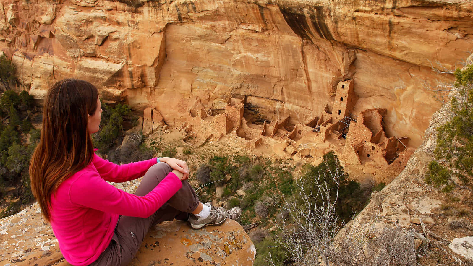 Woman Sitting On A Cliff Mesa Verde National Park Wallpaper