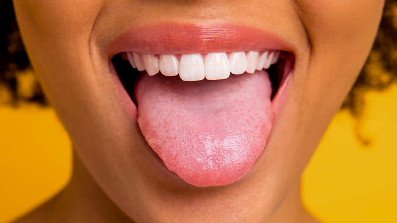 Woman Tongue Out Showing Teeth Wallpaper