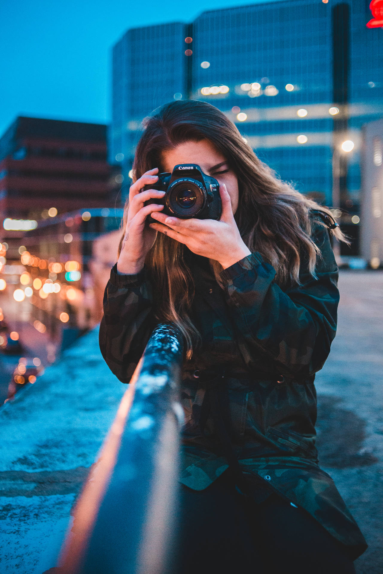 Woman Using Camera Photo Wallpaper