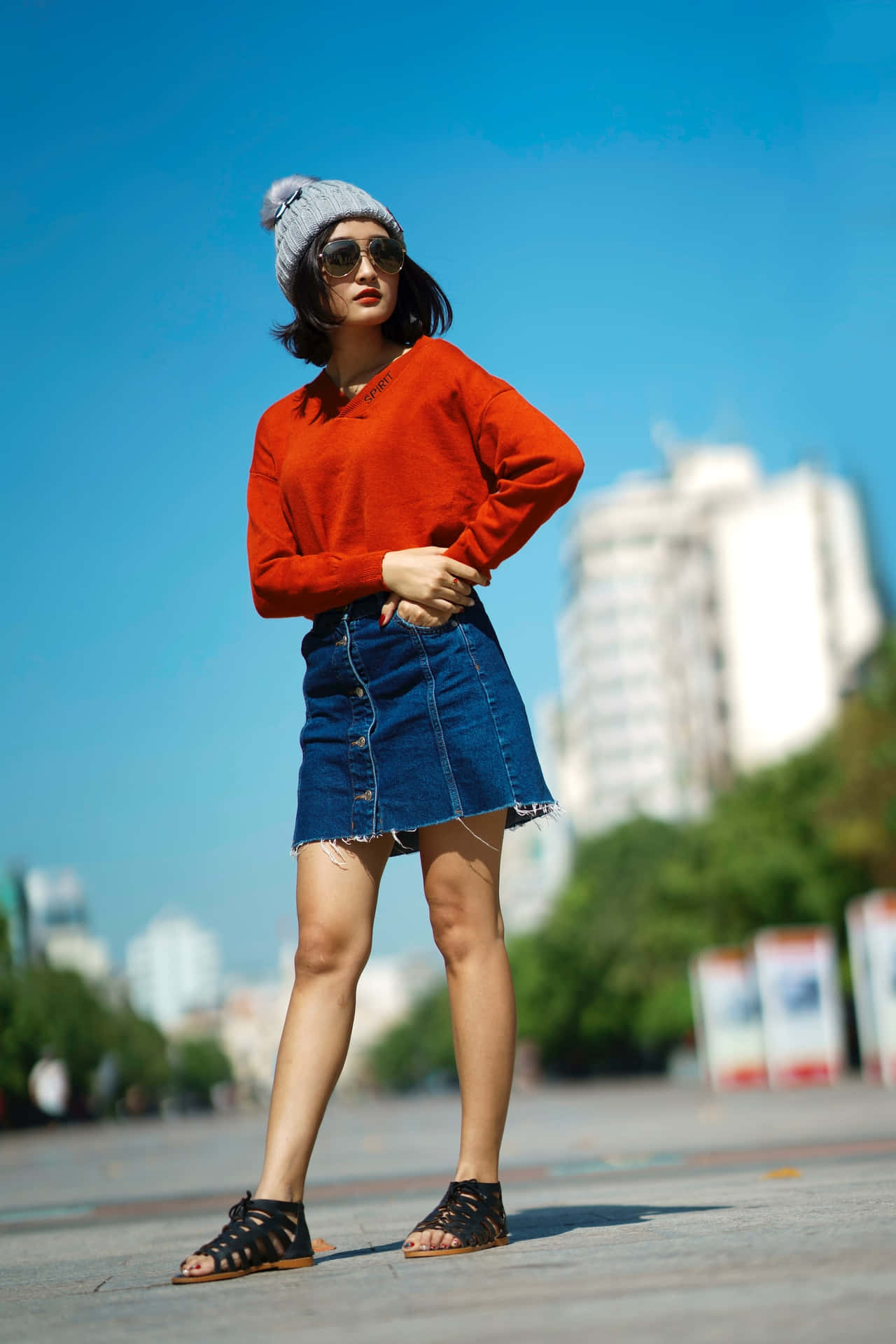 Woman Wearing Denim Miniskirt Wallpaper