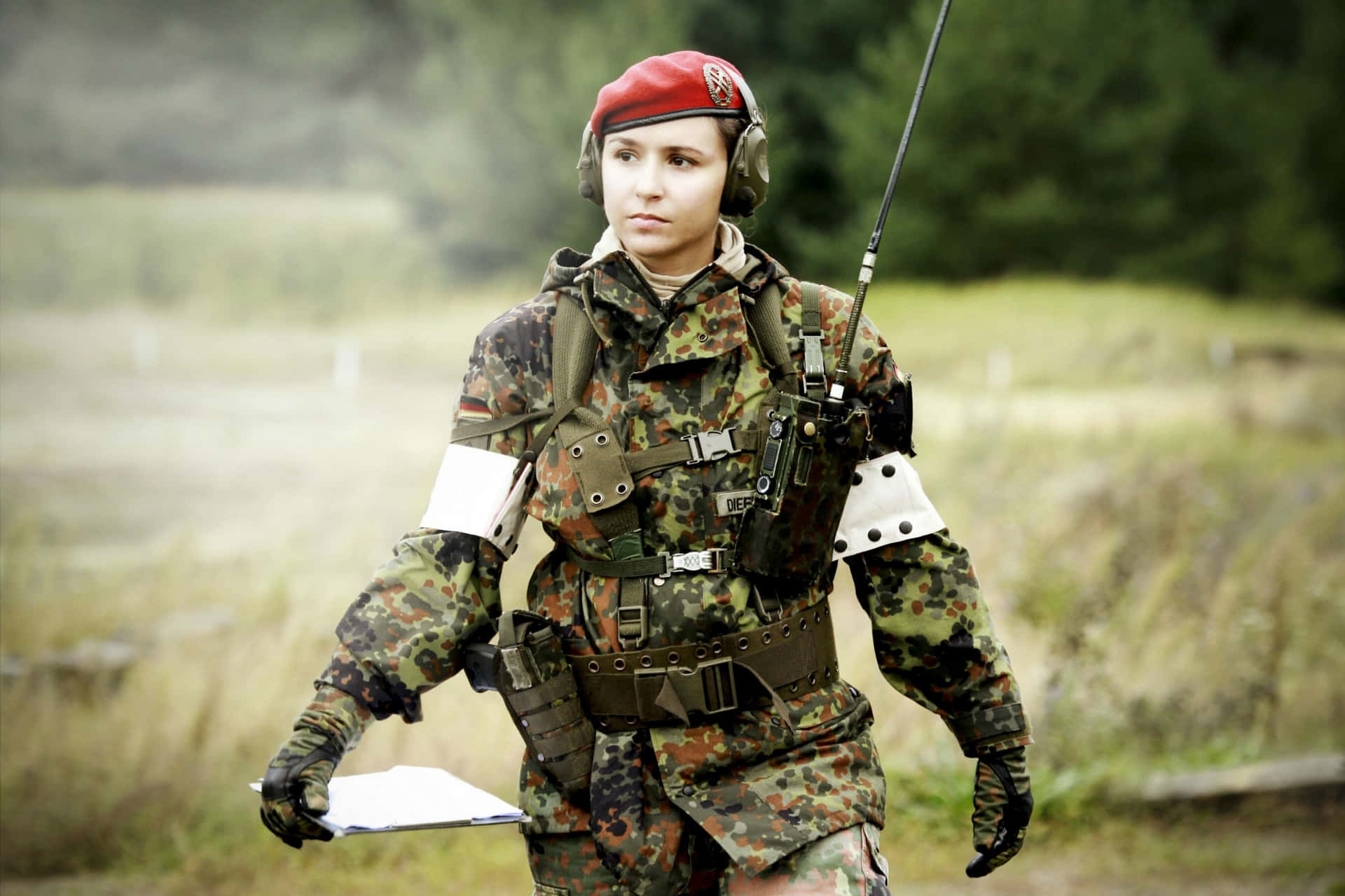 Woman Wearing Uniform On Field Wallpaper
