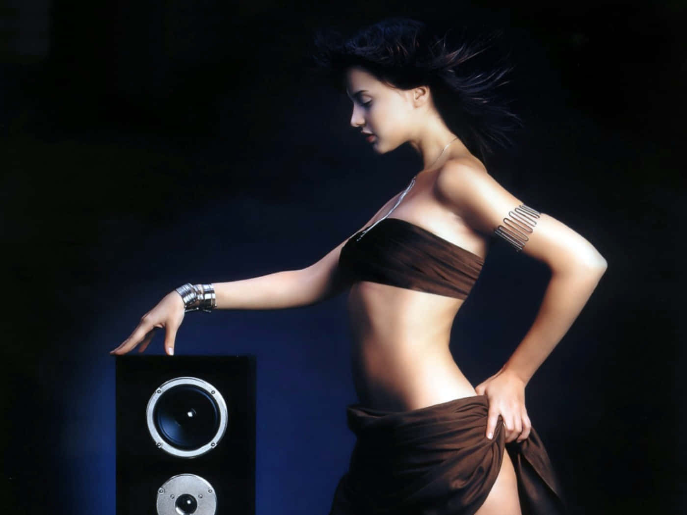 Woman With Black Music Speaker Side Angle Shot Wallpaper