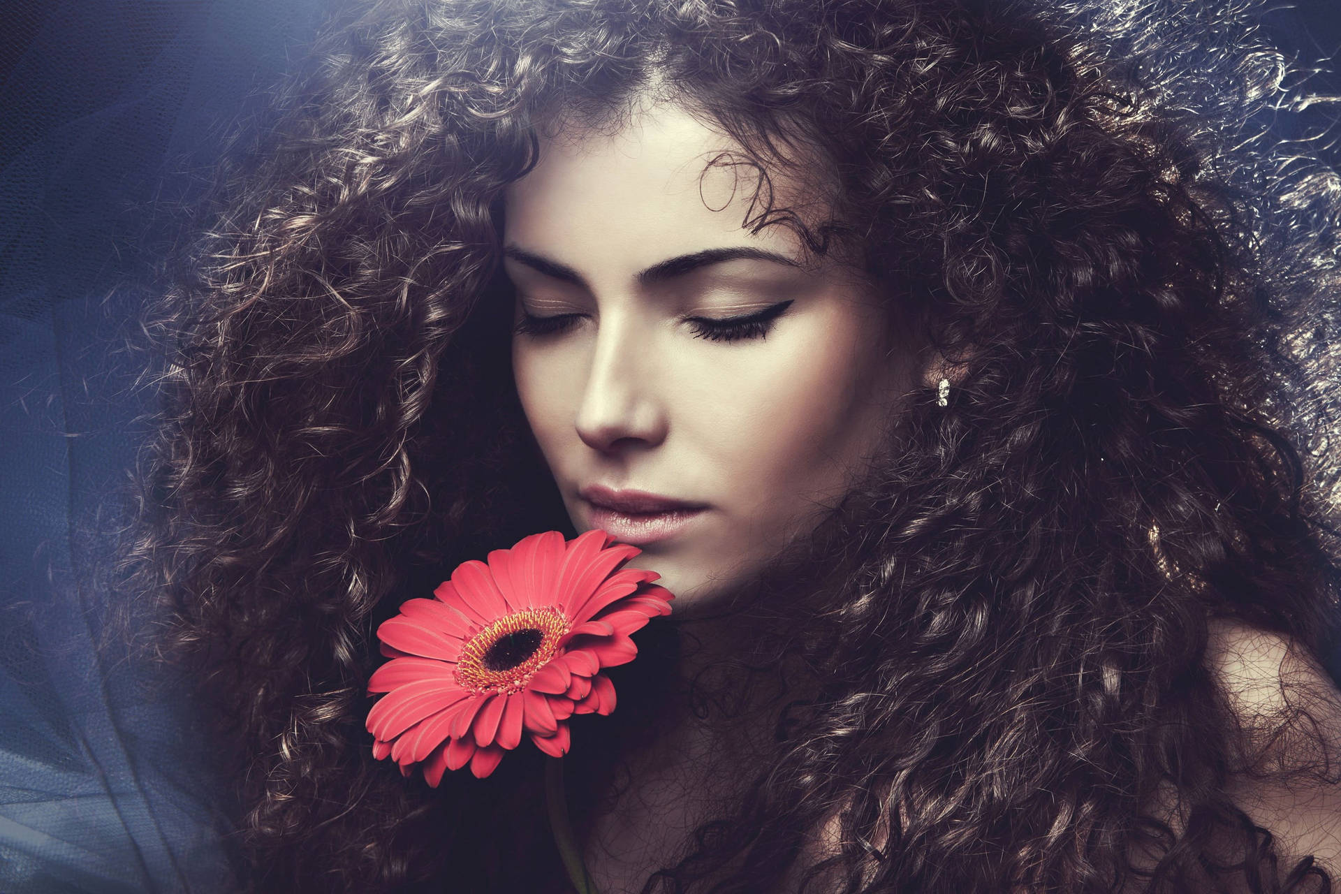 Woman With Curly Hair Holding Flower Background