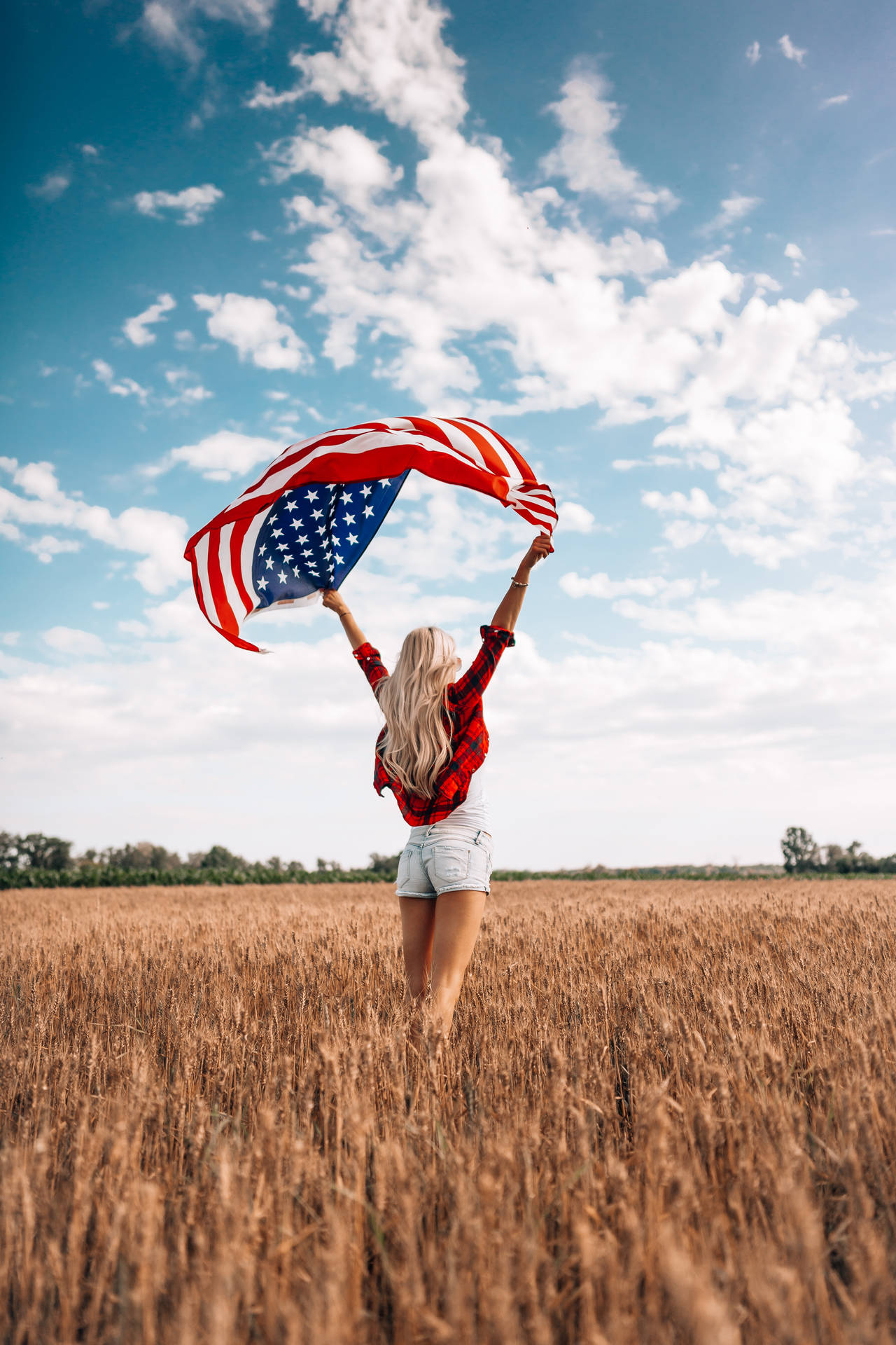 Woman With Flag Standing For Freedom Wallpaper