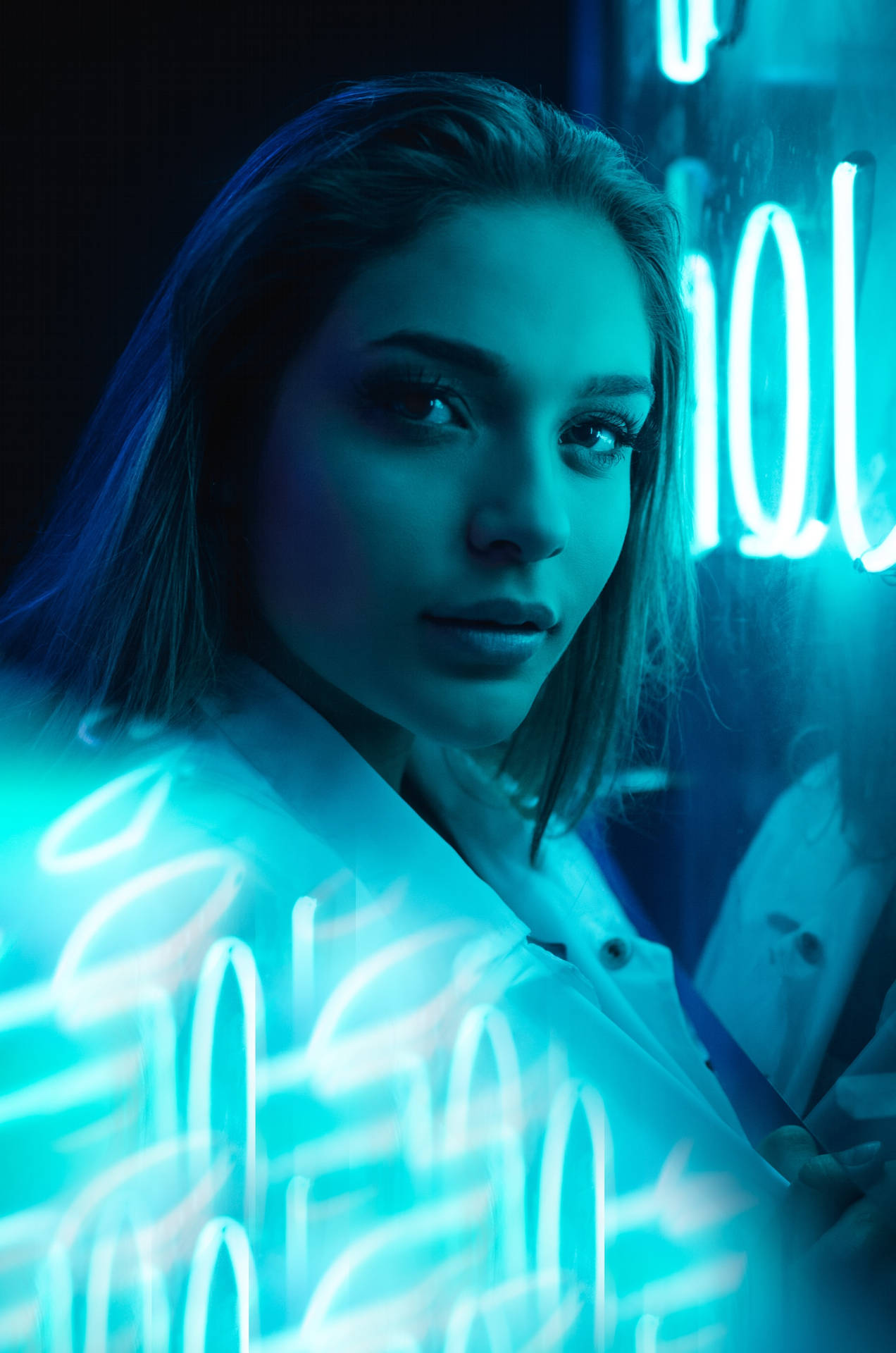 Woman With Glowing Neon Blue Iphone Wallpaper