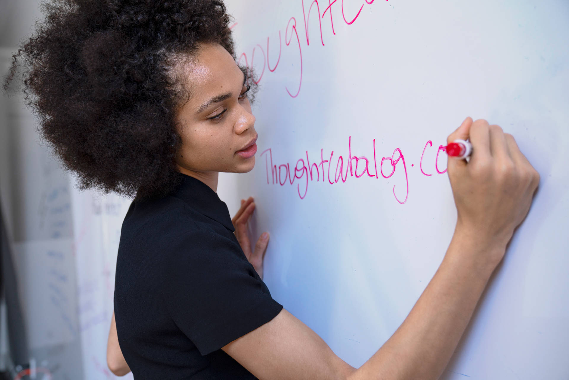Woman Writing On Whiteboard Education Wallpaper